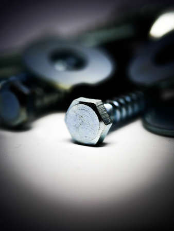 Close-up of various steel nuts and boltsの写真素材