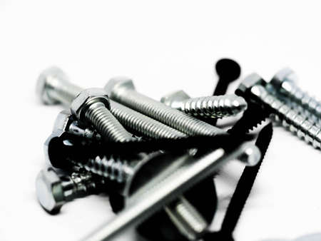 Close-up of various steel nuts and boltsの写真素材