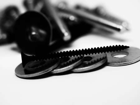 Close-up of various steel nuts and boltsの写真素材