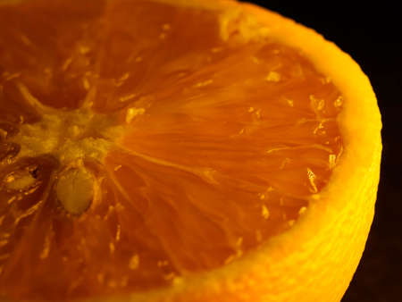 Closeup of fresh morning dew covered orange slices to eat for breakfastの写真素材