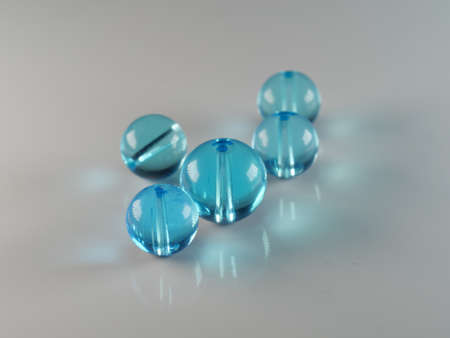 Multi-colored antique or vintage sewing buttons: Celluloid Buttons, Bakelite Buttons, Lucite Buttons, vegetable Ivory, metal, China, glass, and mother of pearl.の写真素材