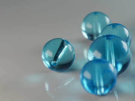 Multi-colored antique or vintage sewing buttons: Celluloid Buttons, Bakelite Buttons, Lucite Buttons, vegetable Ivory, metal, China, glass, and mother of pearl.の写真素材