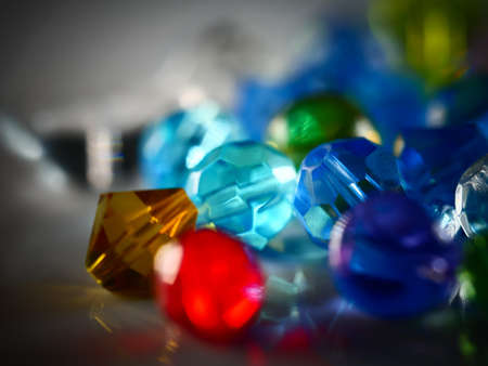 Multi-colored antique or vintage sewing buttons: Celluloid Buttons, Bakelite Buttons, Lucite Buttons, vegetable Ivory, metal, China, glass, and mother of pearl.の写真素材
