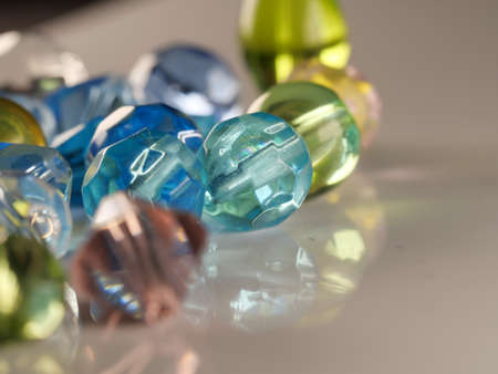 Multi-colored antique or vintage sewing buttons: Celluloid Buttons, Bakelite Buttons, Lucite Buttons, vegetable Ivory, metal, China, glass, and mother of pearl.の写真素材