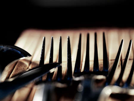 Background of kitchen utensils on wooden kitchen table, selective focus, DOF, macroの写真素材