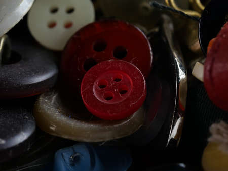 Collection of assorted spare clothes buttons. Macro. DOFの写真素材