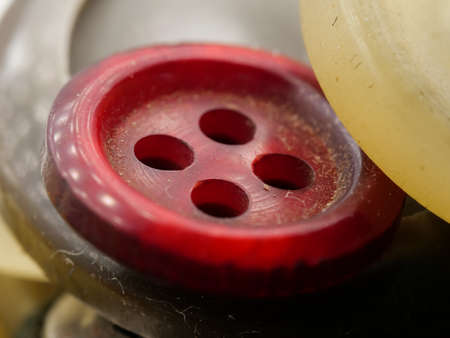 Collection of assorted spare clothes buttons. Macro. DOFの写真素材