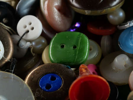 Collection of assorted spare clothes buttons. Macro. DOFの写真素材