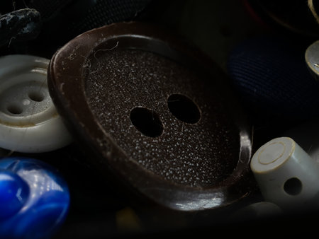 Collection of assorted spare clothes buttons. Macro. DOFの写真素材