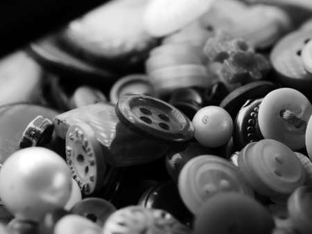 Collection of assorted spare clothes buttons. Macro. DOFの写真素材