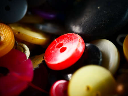 Collection of assorted spare clothes buttons. Macro. DOFの写真素材