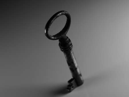 A golden key isolated on white background. Old rusty door key. Antique gold key. DOF.の写真素材