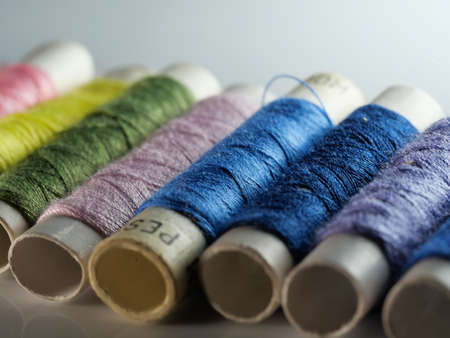Sewing threads multicolored background closeup, selective focus, macroの写真素材