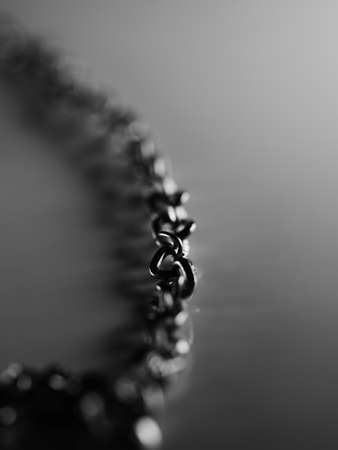 Necklace chain on white background, selective focus, macroの写真素材