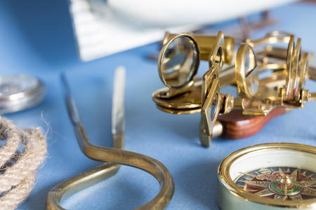 Various pieces of nautical equipment on blue backgroundの写真素材