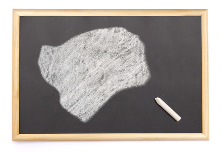 Blackboard with a chalk and the shape of Guinea-Bissau drawn onto. (series)の写真素材