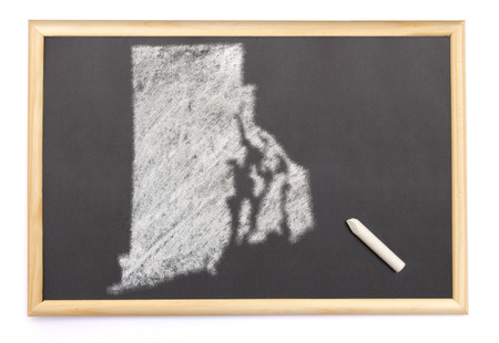Blackboard with a chalk and the shape of Rhode Island drawn onto. (series)の写真素材