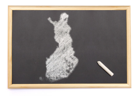 Blackboard with a chalk and the shape of Finland drawn onto. (series)の写真素材