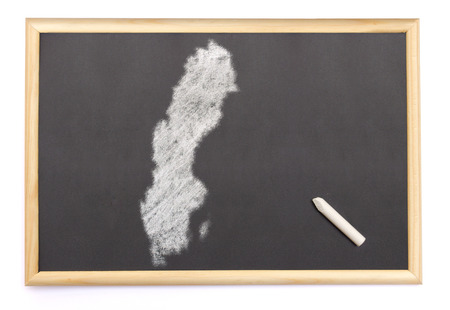 Blackboard with a chalk and the shape of Sweden drawn onto. (series)の写真素材