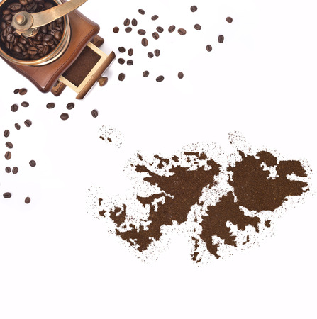 Coffee powder in the shape of Falkland Islands and a decorative coffee mill.(series)の写真素材