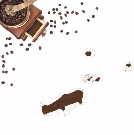 Coffee powder in the shape of Johnston Atoll and a decorative coffee mill.(series)の写真素材