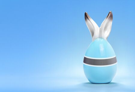 Colorful cute ceramic easter egg with rabbit ears and the flag of Botswana .(series)