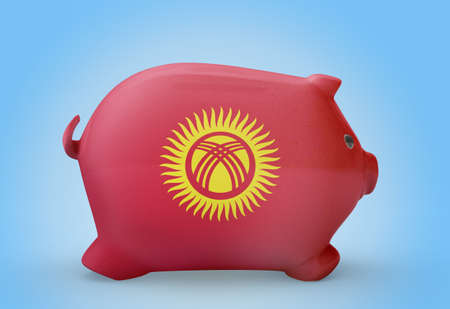 Side view of a piggy bank with the flag design of Kyrgyzstan.(series)の写真素材
