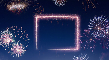 A dark night sky with a sparkling red firecracker in the shape of Wyoming composed into.(series)の写真素材