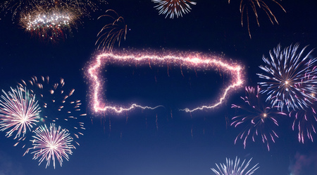 A dark night sky with a sparkling red firecracker in the shape of Puerto Rico composed into.(series)の写真素材