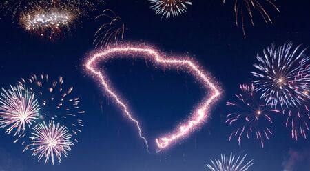 A dark night sky with a sparkling red firecracker in the shape of South Carolina composed into.(series)の写真素材