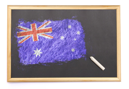 Blackboard with the national flag of Australia drawn on and a chalk.(series)の写真素材