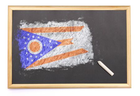 Blackboard with the national flag of Ohio drawn on and a chalk.(series)の写真素材