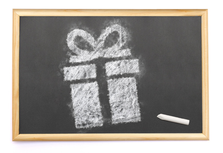 Blackboard with a gift drawn on and a single chalk.(series)の写真素材