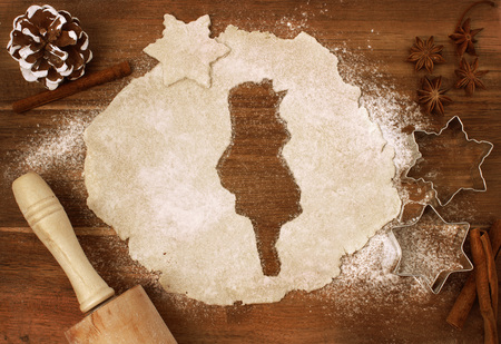 Festive cookie dough with the shape of Tunisia cut out (series)の写真素材