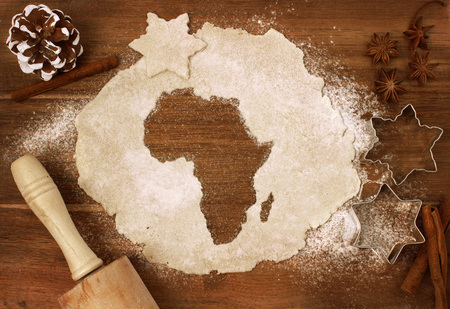 Festive cookie dough with the shape of Africa cut out (series)の写真素材