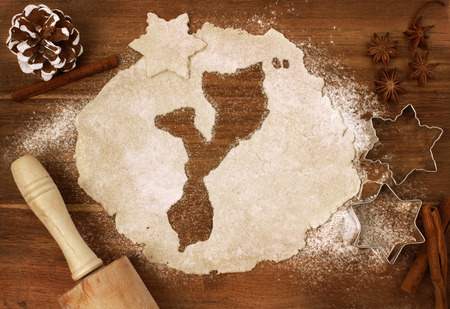 Festive cookie dough with the shape of Mozambique cut out (series)の写真素材