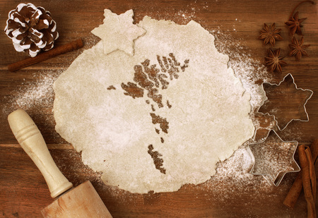 Festive cookie dough with the shape of Faroe Islands cut out (series)の写真素材
