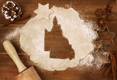Festive cookie dough with the shape of Queensland cut out (series)の写真素材