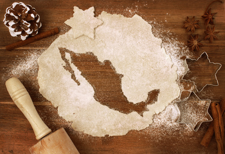 Festive cookie dough with the shape of Mexico cut out (series)の写真素材