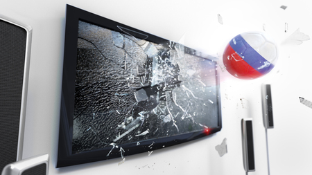 Soccer ball with the flag of Russia flying through a shattering tv screen.(3D rendering series)の写真素材