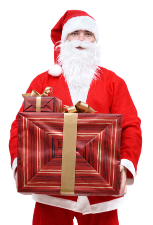Santa Claus with Christmas gifts on a white background, isolatedの写真素材