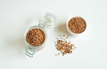 Buckwheat grains on white tableの写真素材