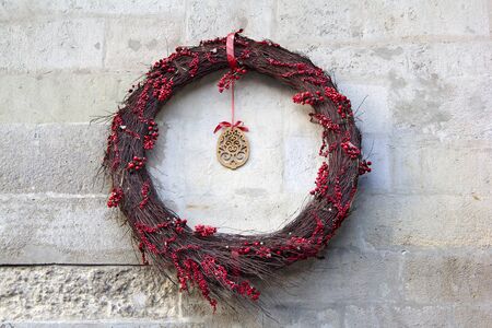 christmas wreath on the wallの写真素材