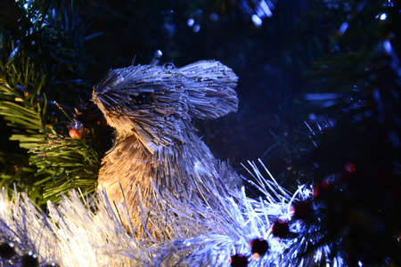 Christmans tree decoration eco toys, rabbit made from straw and lightened with shiny bulbs