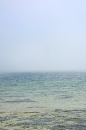 Ravda, Bulgaria. May, 20, 2014. Sea mist. water surface covered with aerozole. Foggy seashore defocused blurry backgroundの写真素材