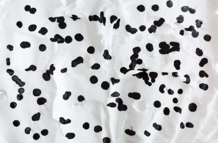 Abstract texture foam background with black dropsの写真素材
