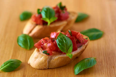 bruschetta with tomatoes and basilの写真素材