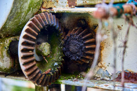 Old rusty gears in the lifting mechanismの写真素材