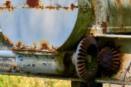 Old rusty gears in the lifting mechanismの写真素材