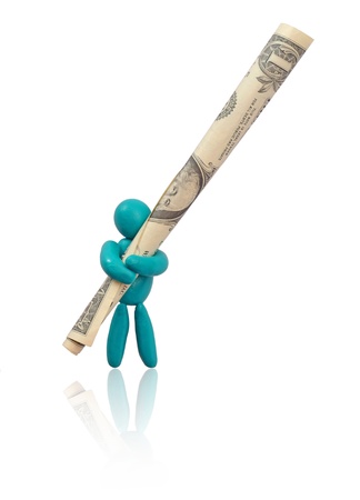 The plasticine little man who holds an one-dollar banknote in handsの写真素材